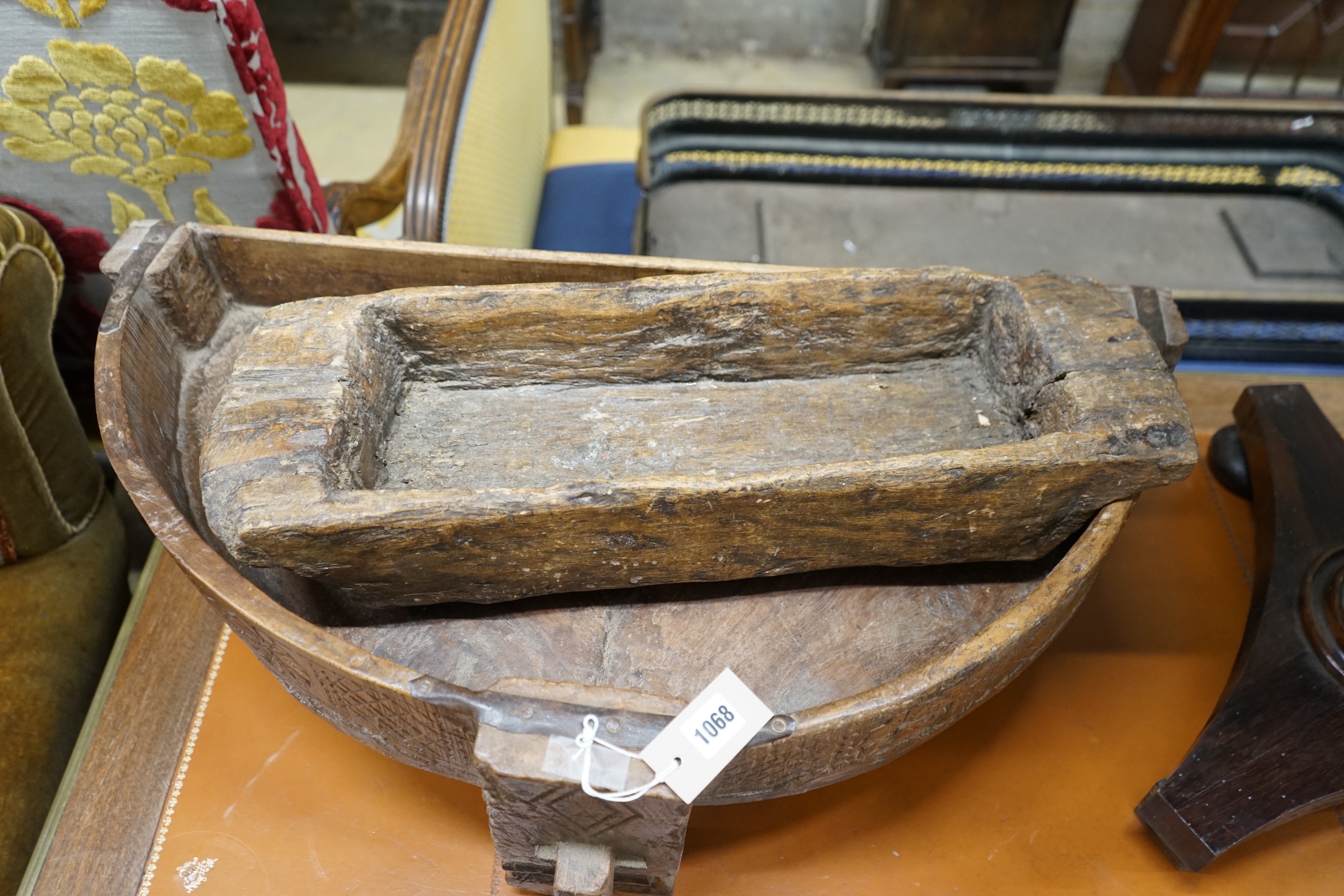 An Afghan D shaped chip carved mazer and one other, larger width 80cm, depth 40cm, height 27cm